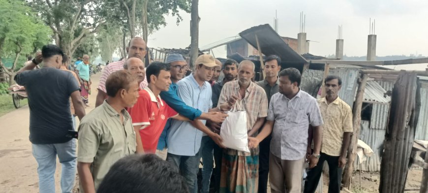 মান্দায় জলাবদ্ধতায় ক্ষতিগ্রস্ত মানুষের মাঝে যুবদলের খাবার বিতরণ